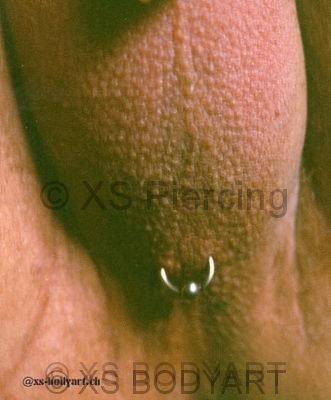 Mann piercing intim 